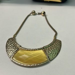 Ladies gold tone warrior necklace 8.5 inches long